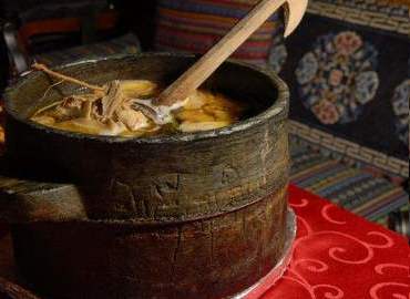 Stone bowl chicken is the most famous cuisine from Nyingchi. Stone bowl chicken is the most famous cuisine from Nyingchi.