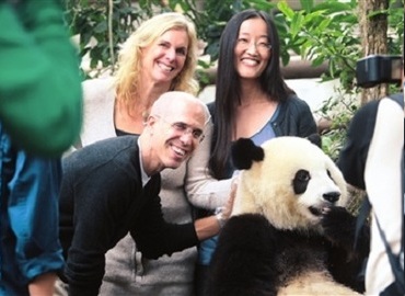 Tourists are obsessed with lovely pandas. Tourists are obsessed with lovely pandas.